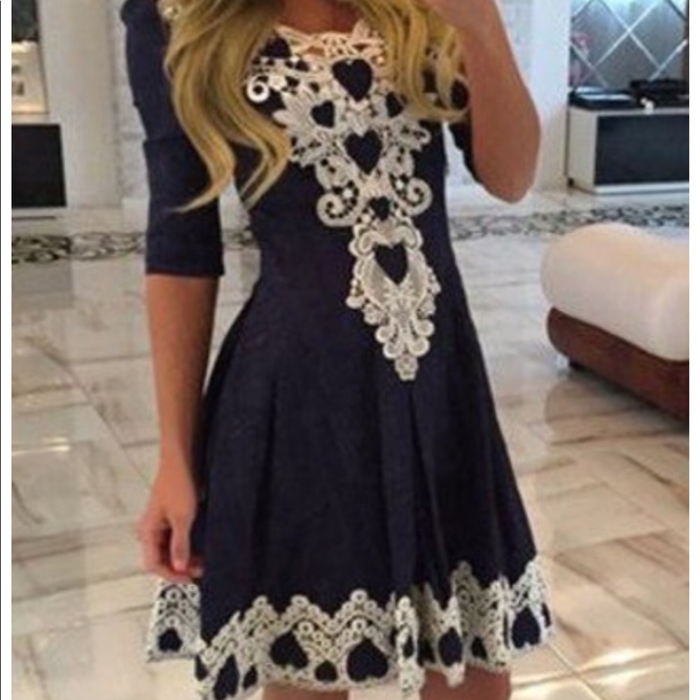 Knee length Navy blue dress with white accent lace